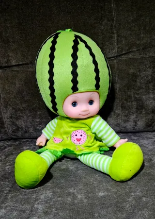 Muñeca suave musical cabeza fruta