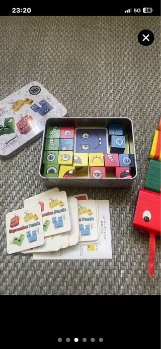 Puzzle de madera con caras divertidas y regalo