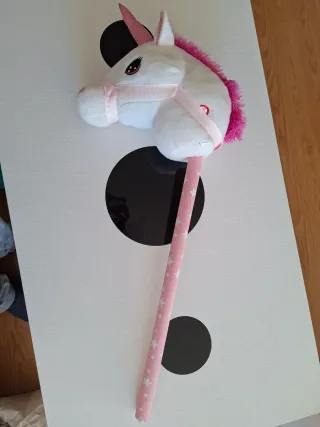 Unicornio con palo musical