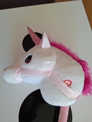 Unicornio con palo musical