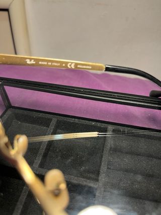 Gafas de sol Ray-Ban Clubmaster negras y doradas