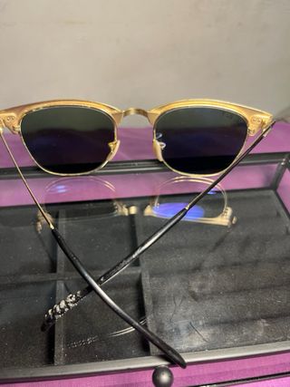 Gafas de sol Ray-Ban Clubmaster negras y doradas