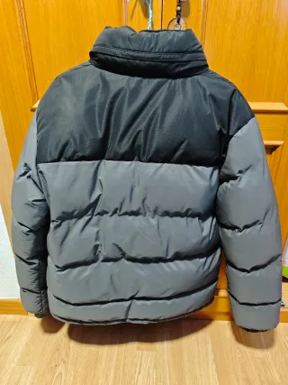 Abrigo de plumas nuevo