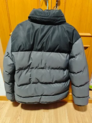 Abrigo de plumas nuevo