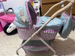 Carro de muñecas rosa y verde