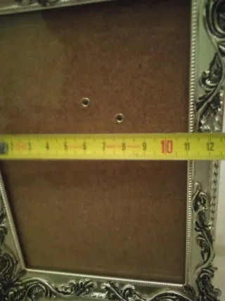 Portafotos de metal plateado