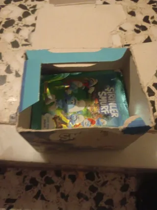 Caja de cromos Los Pitufos