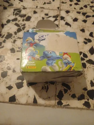 Caja de cromos Los Pitufos