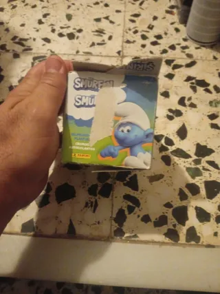 Caja de cromos Los Pitufos