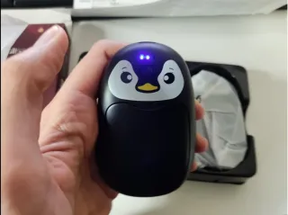 Calentador de manos pingüino recargable