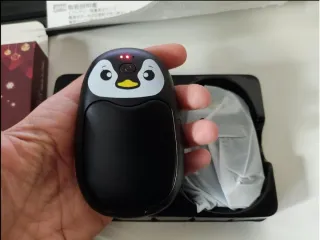 Calentador de manos pingüino recargable