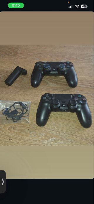 PS4 (PlayStation 4) con 2 mandos y juegos
