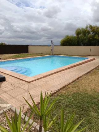 Alquilo en parcela cerca de sevilla