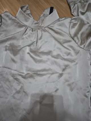 Conjunto pantalón y blusa con casaca