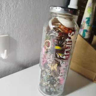 Bote de bisutería variada