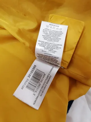 Piumino con cappuccio T. 14 anni "Primigi".