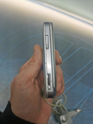 Teléfono, movil,  SAMSUNG SGH-E250 color plata- orange