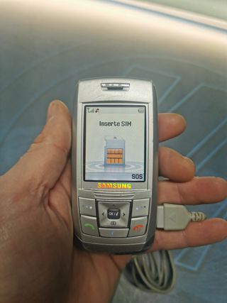 Teléfono, movil,  SAMSUNG SGH-E250 color plata- orange