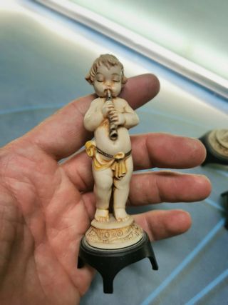 Lote 4 figuras Depositato niños con instrumentos