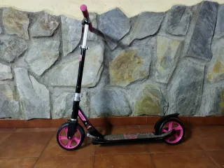 Patinete Oxelo rosa y negro