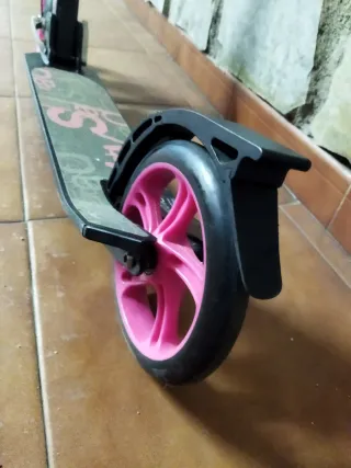 Patinete Oxelo rosa y negro