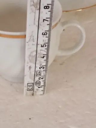 Servizio 6 tazze caffè porcellana oro.