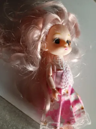 Muñeca articulada pelo rosa