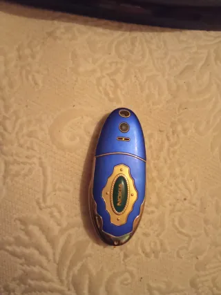 Teléfono Nokia E1000 Azul/Dorado