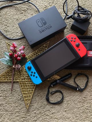 Nintendo Switch Azul/Rojo + Accesorios Originales