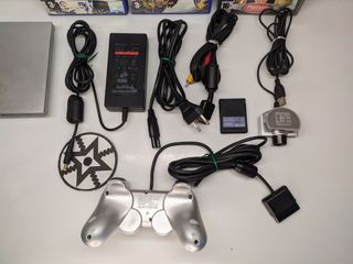 PS2 Slim Plateada SCPH-70004 + Juegos + Eye Toy