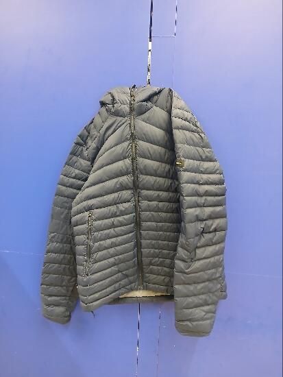 Plumífero de montaña y trekking con capucha Mujer Forclaz