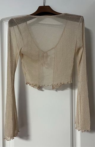 Rebeca dorada brillante transparente. Talla xs y s
