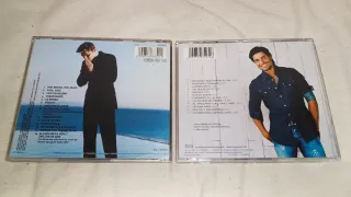 CDs Ricky Martin y Chayanne