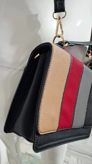 Bolso de mano con diseño de bloques de color