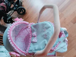 Carrito de muñecas rosa y azul