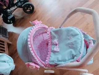 Carrito de muñecas rosa y azul