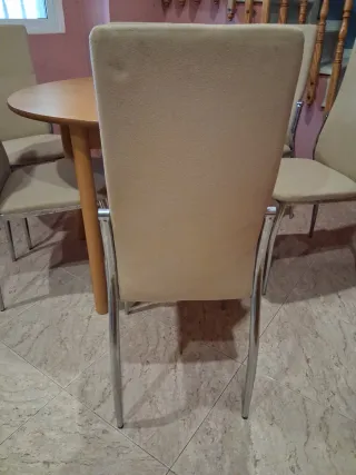 Mesa redonda extensible y 6 sillas