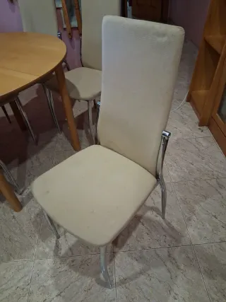 Mesa redonda extensible y 6 sillas