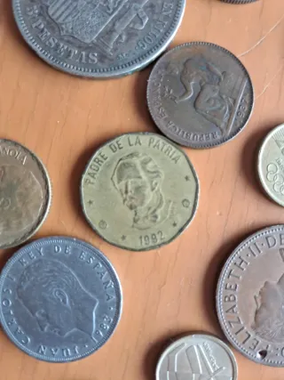 Lote de monedas y billete antiguo