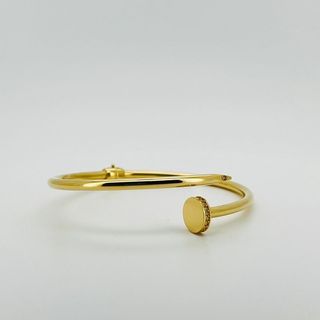 PULSERA RIGIDA CLAVO CON CIRCONITAS. Oro 18k. Peso