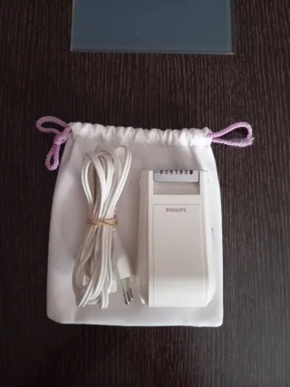 Depiladora Philips con funda y cable