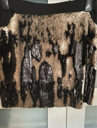 Falda lentejuelas doradas y negra