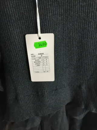 Vestido negro cuello alto tul