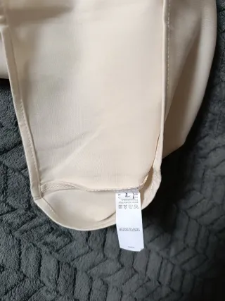 Conjunto top y falda plisada beige