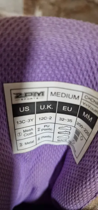 Patines en línea morados y negros