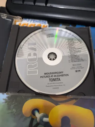 CD Tomita Pictures at an Exhibition