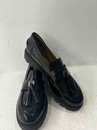 Mocassini donna in naplak moro con nappine