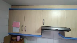 Muebles de cocina de madera y piedra