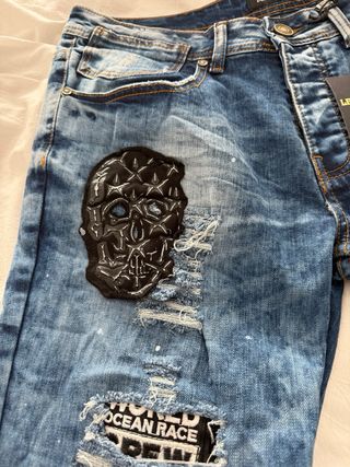 Pantalon tejano Calavera Azul Rotos