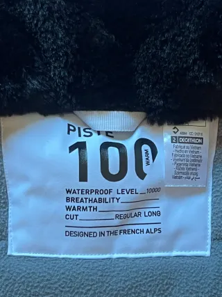 Abrigo Decathlon blanco talla xxs y XS